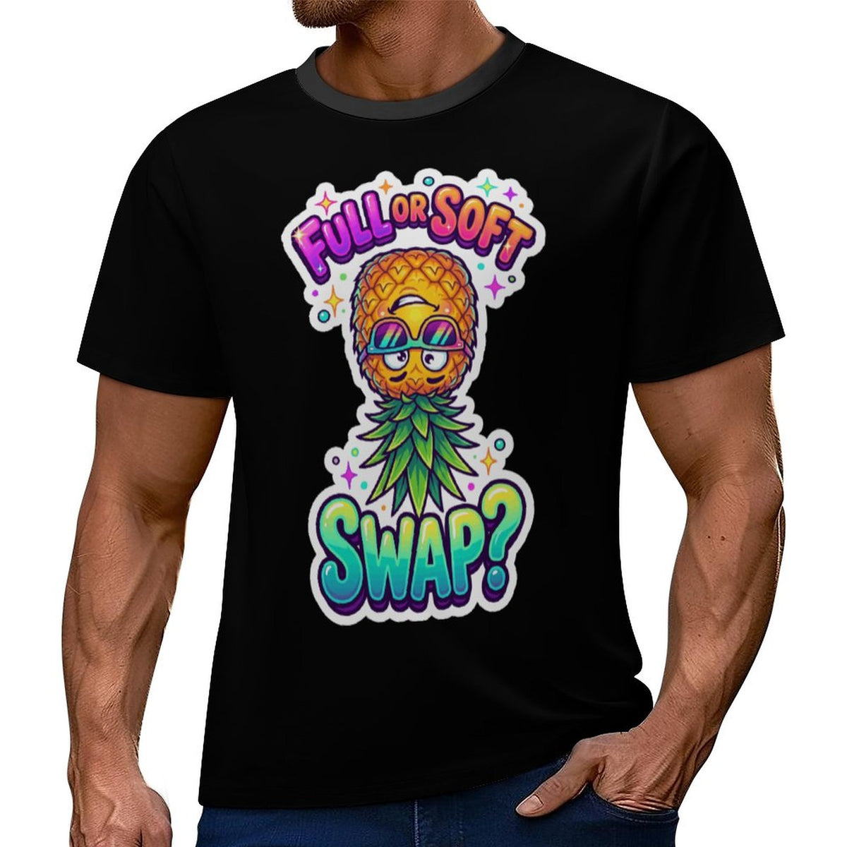 A man wearing a black short-sleeve t-shirt with a colorful graphic of a pineapple wearing sunglasses and a green leafy mustache, with the text 'FULL OR SOFT SWAP?' in a playful gradient font.