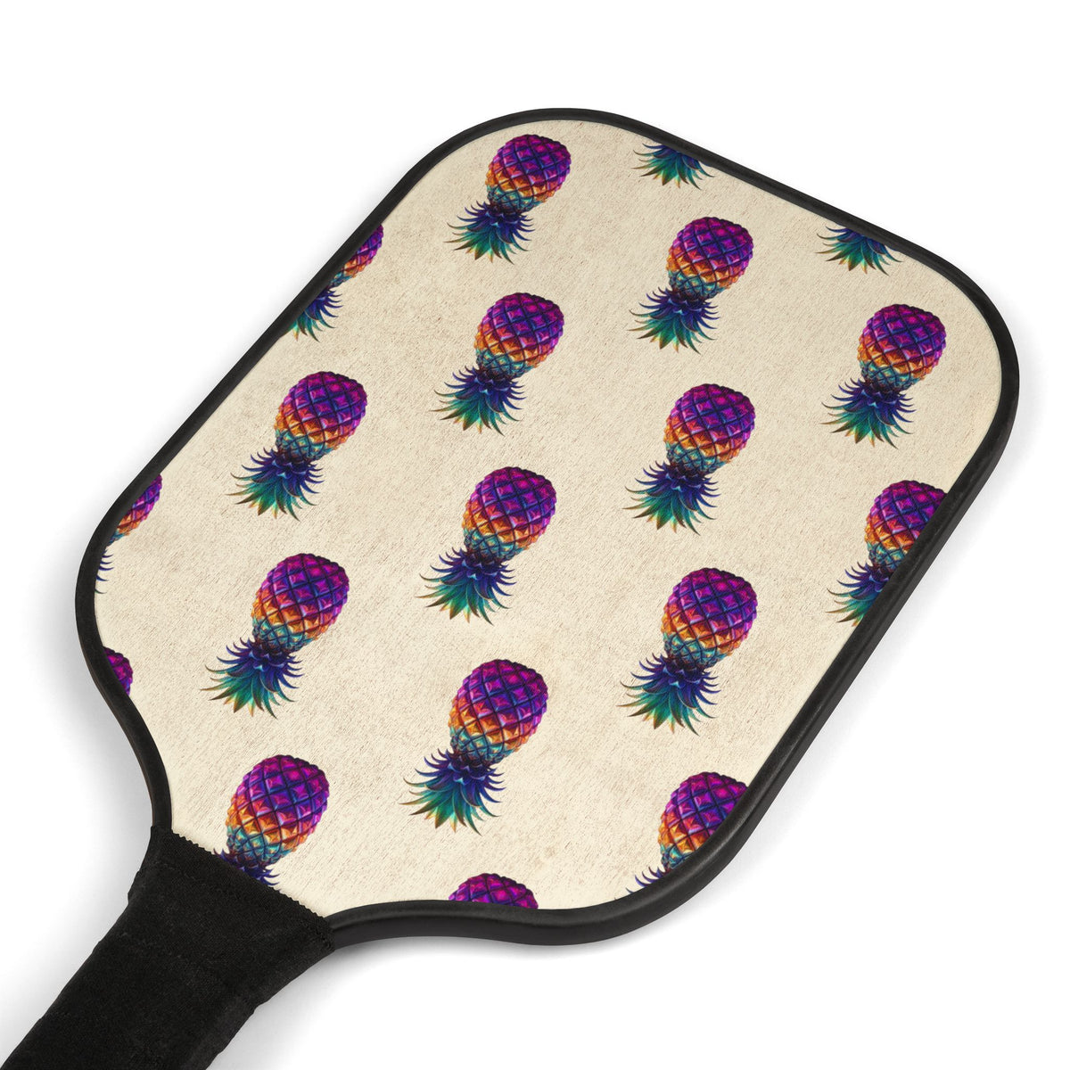 Close-up of the pineapple pickleball paddle’s poly-cotton fabric-wrapped handle and black edging.