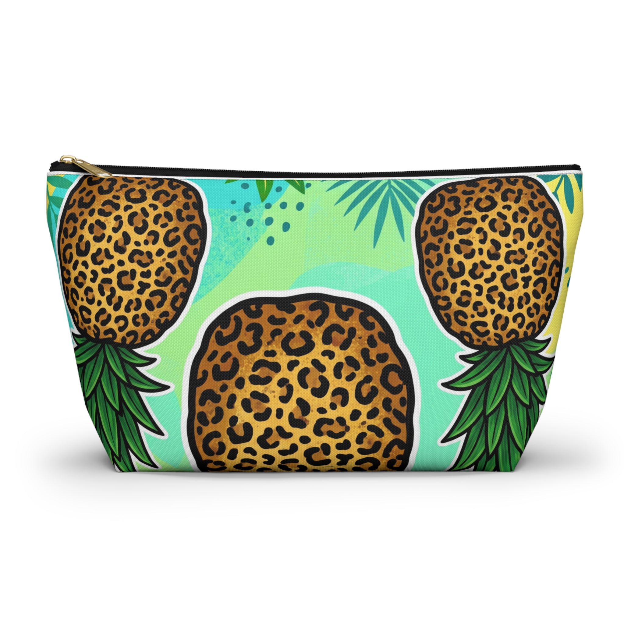 A rectangular zip pouch with a colorful tropical print featuring three pineapple-like fruits with leopard-print tops and green leaves on a mint and light green background.