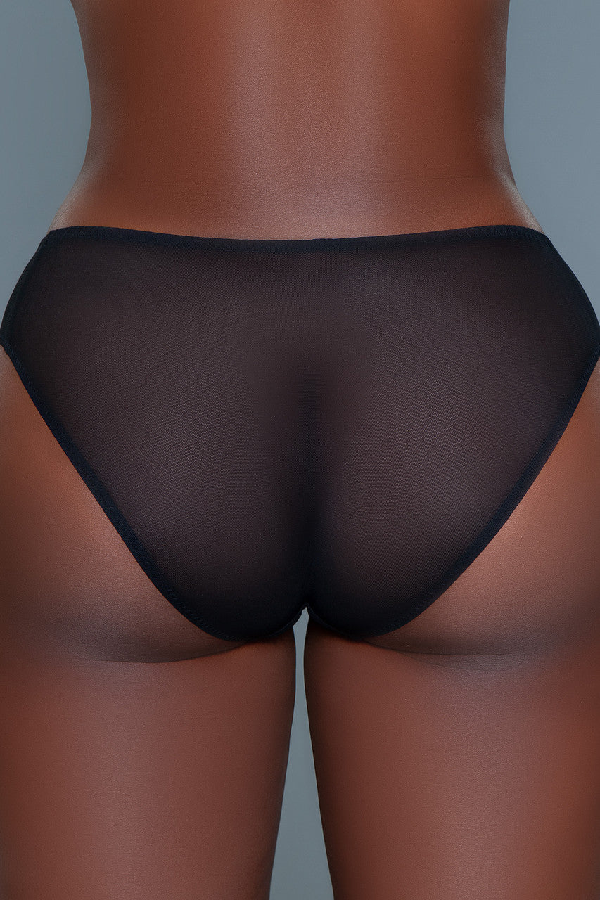 Black sheer underwear on a gray background