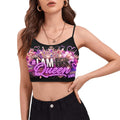 Woman wearing a crop top in black with a graphic #IAMHISQUEEN graphic on the chest.
