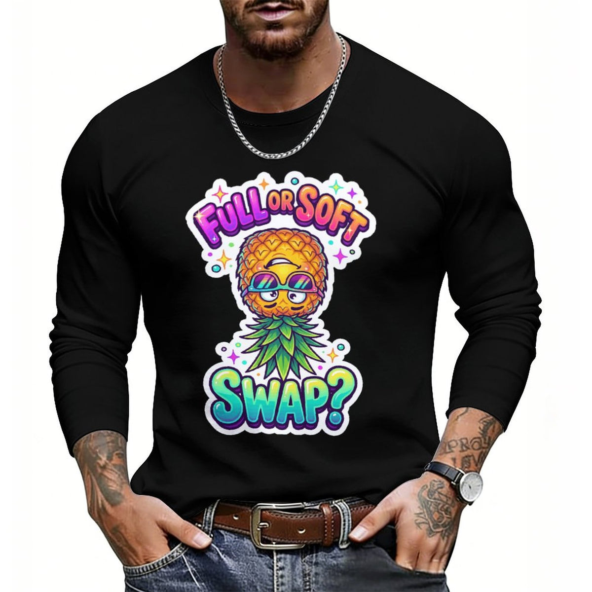 A man wearing a black long-sleeve t-shirt with a colorful graphic print of a pineapple character wearing sunglasses and a green leaf mustache, with the text 'FULL OR SOFT SWAP?'.