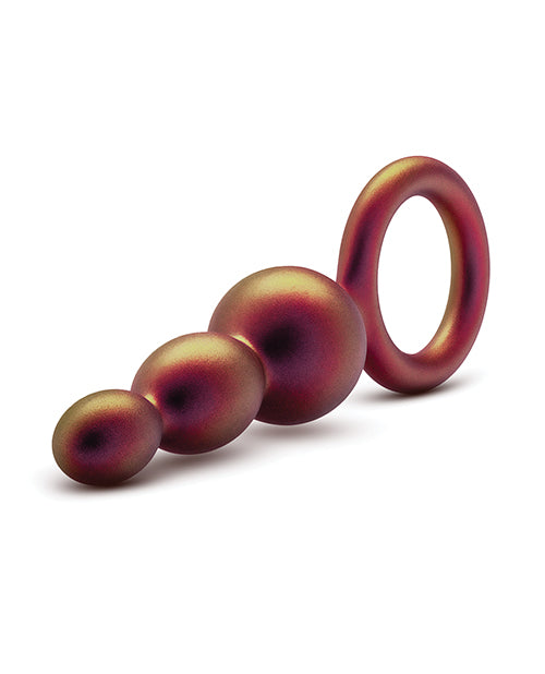 Three-tiered purple object on a white background