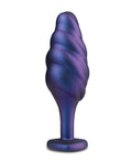 Purple swirl-shaped object on a white background