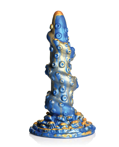 Blue and gold decorative object on a white background