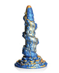 Blue and gold decorative object on a white background