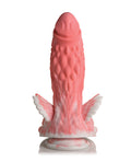 Pink silicone product with angel wings on a white background