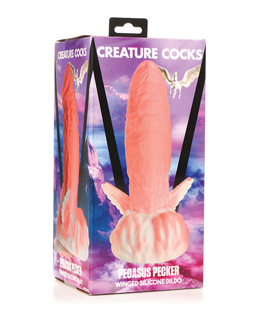 Silicone dildo packaging with 'Creature Cocks' branding on a colorful background
