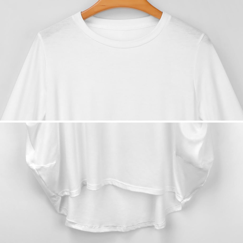 A white short-sleeve t-shirt with a high-low hemline, displayed on a wooden hanger against a light gray background.