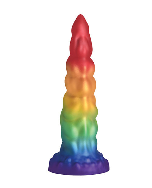 Multicolored unicorn horn toy on a white background