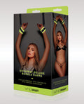 Box of whipSMART Doorway Deluxe Buckle Cuffs with a model holding straps.