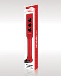 Red.spanking paddle with black hearts in packaging on a white background