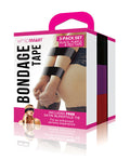 Box of whipsmart bondage tape with a person wearing black, purple, and red tapes on a white background.