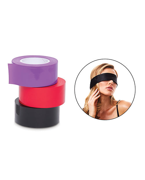 Three rolls of tape in purple, red, and black with a woman wearing a black blindfold inset.