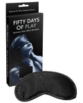 Black satin blindfold with packaging labeled 'Fifty Days of Play' on a white background