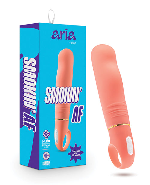 Coral-colored product with 'Smokin' AF' text next to its packaging on a white background