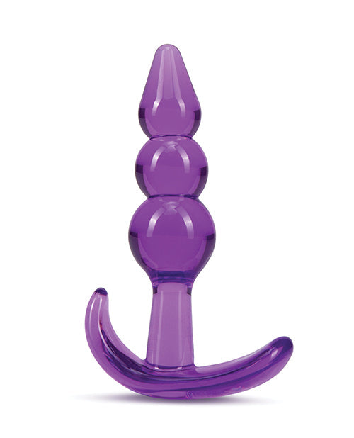 Purple plastic object on a white background