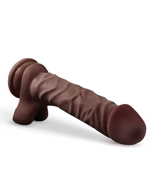 Brown silicone dog toy on a white background