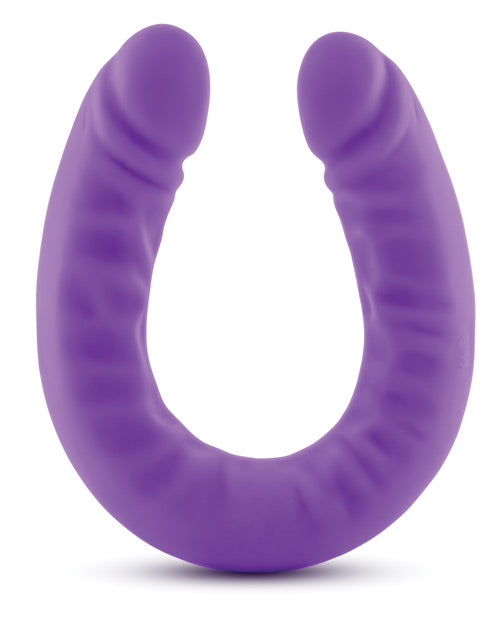 Purple U-shaped silicone ring on a white background