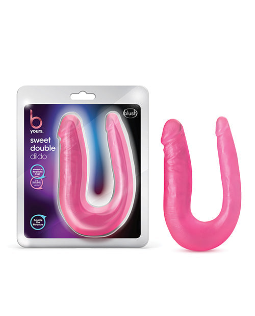 Pink U-shaped toy with packaging labeled 'b yours' on a white background