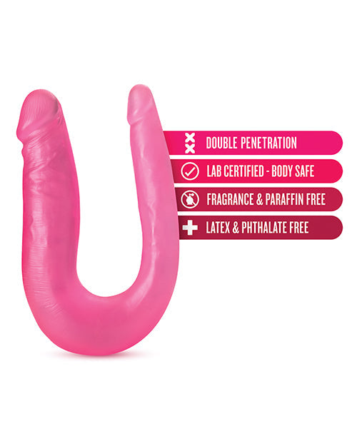 Pink U-shaped object with certification labels on a white background