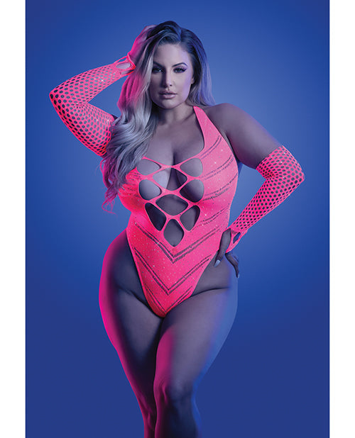 Model wearing a pink cut-out bodysuit with matching gloves against a blue background