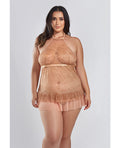 Woman wearing a sheer beige lace nightgown on a light gray background