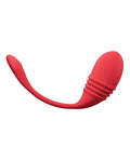 Red silicone butt plug on a white background