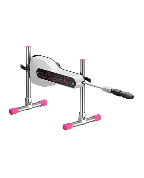 Metallic tool with pink accents on a white background