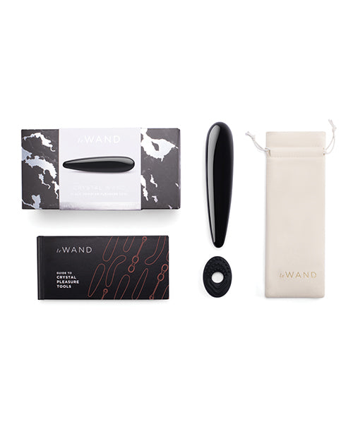 LeWAND product set with packaging, black device, and pouch on a white background