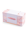 Marble-patterned box with a rose gold handle on a white background