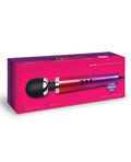 Pink packaging of a hair styling tool with a black and red design on a white background