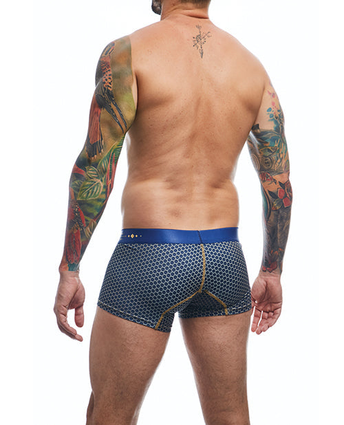 Man wearing patterned underwear with tattoos on arms and back