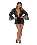 Woman wearing a sheer black robe on a white background