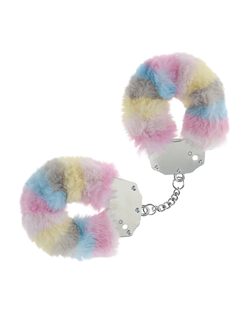 Pastel fuzzy handcuffs on a white background