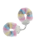 Pastel fuzzy handcuffs on a white background