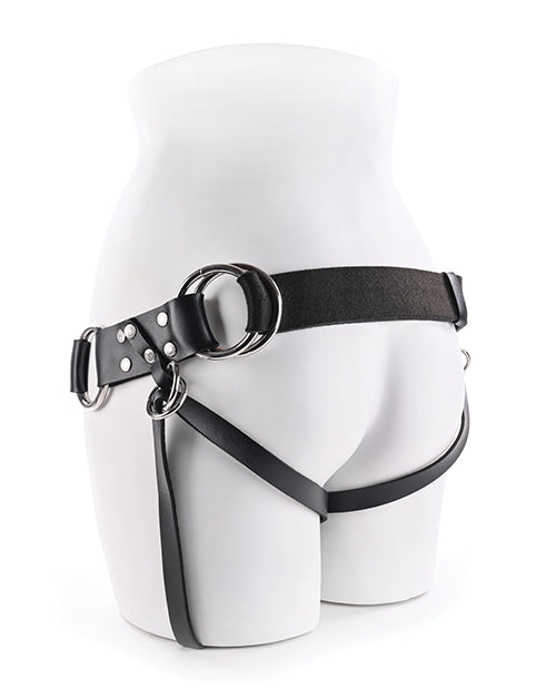Black leather harness on a white mannequin against a white background