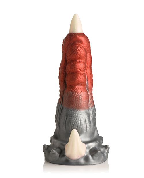 Decorative candle with red and silver design on a white background