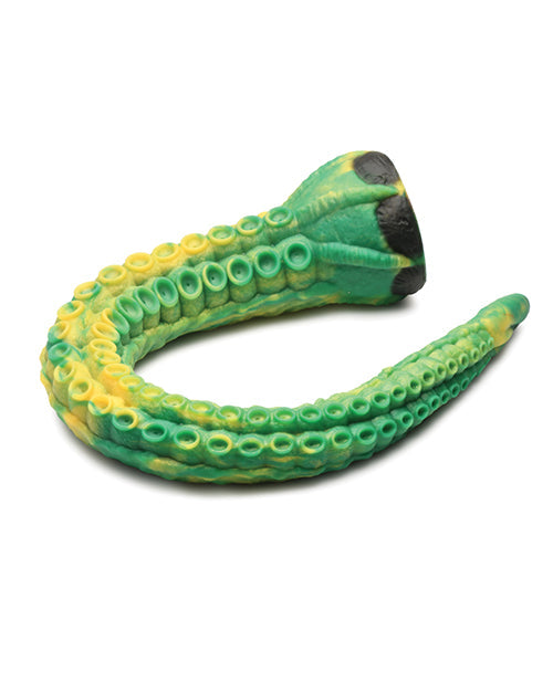 Green and yellow octopus-shaped toy on a white background