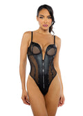 Woman wearing a black studded bodysuit on a white background