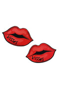 Two red lips with the word 'kisses' on a white background