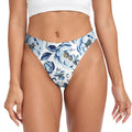 Woman standing wearing Wicked Lifestyles' Floral Sexy thongs. 