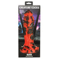 Silicone dildo packaging with 'Creature Cocks' branding on a white background