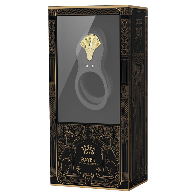 Decorative box with a gold emblem and black design on a white background