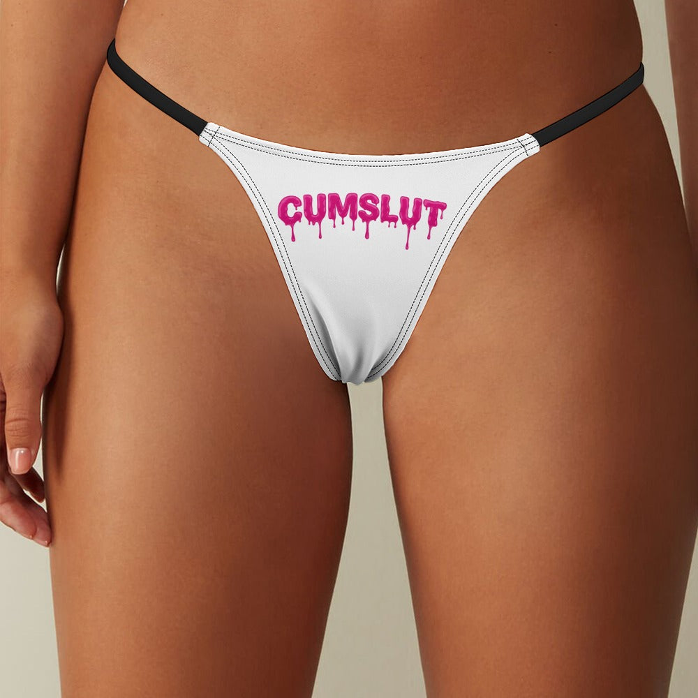 Woman wearing panties that say Cumslut on them in a dripping font