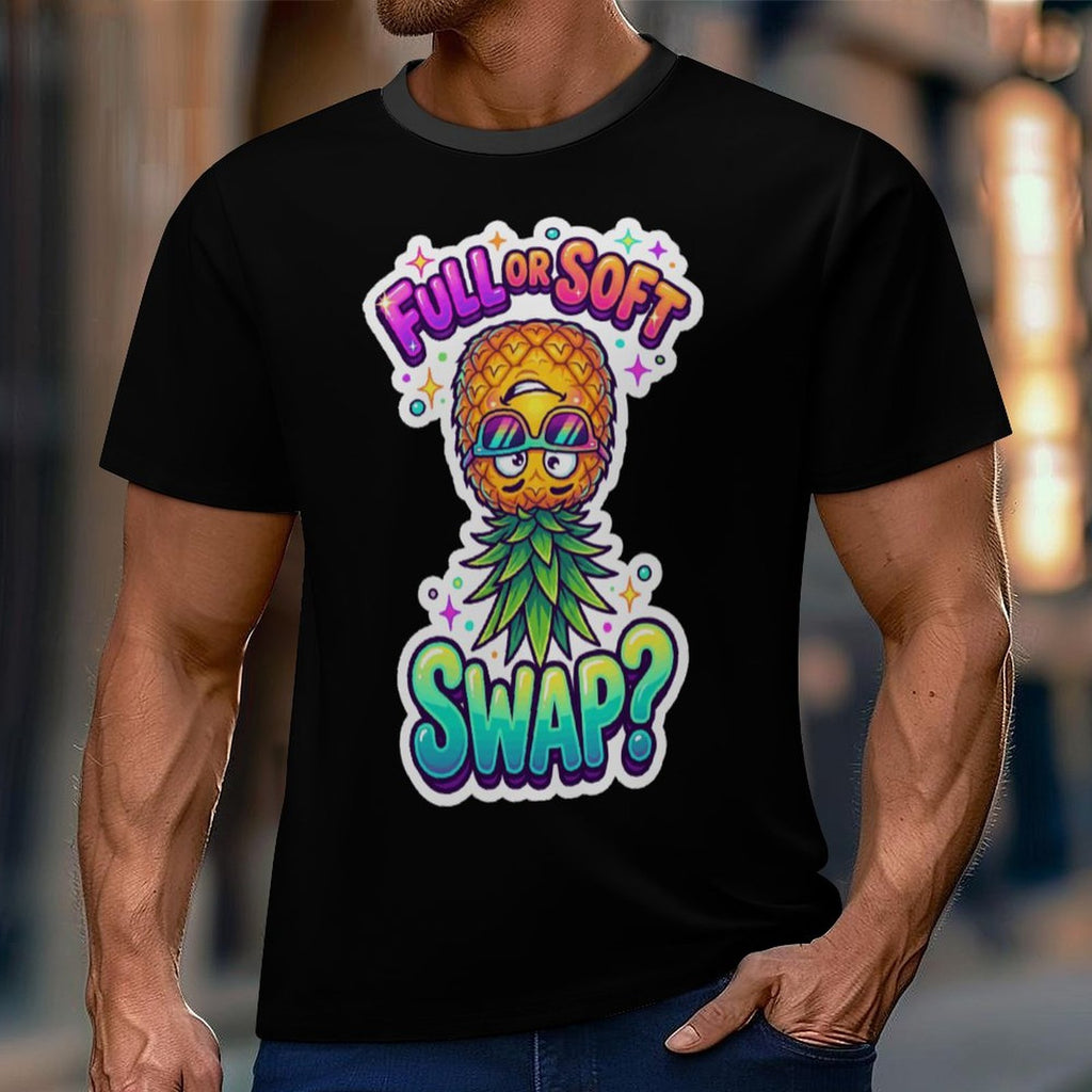 A man wearing a black short-sleeve t-shirt with a colorful graphic of a pineapple wearing sunglasses and a green leafy mustache, with the text 'FULL OR SOFT SWAP?' in a rainbow gradient.