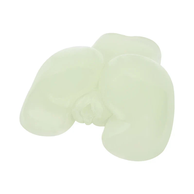 Light green U-shaped pillow on a white background