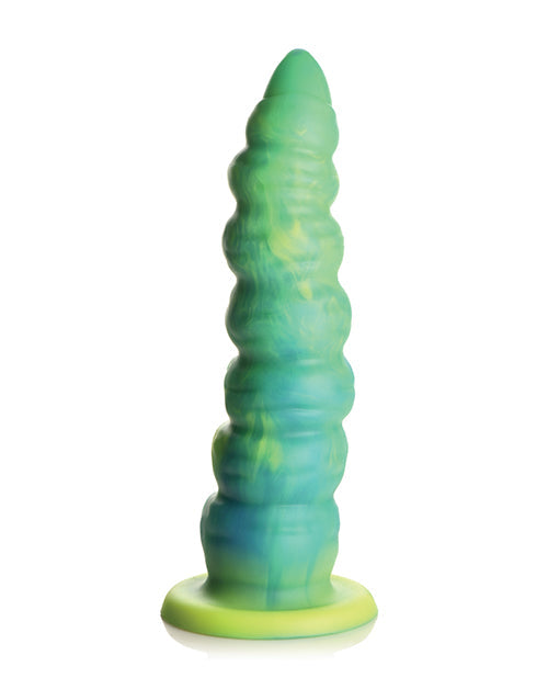 Green and blue silicone toy on a white background