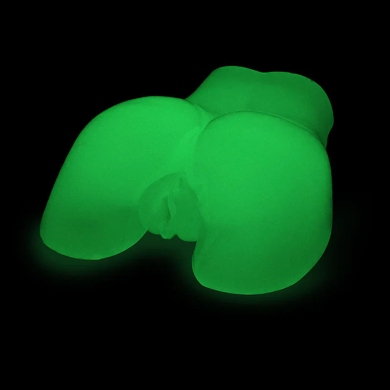 Glowing green elephant-shaped object on a black background