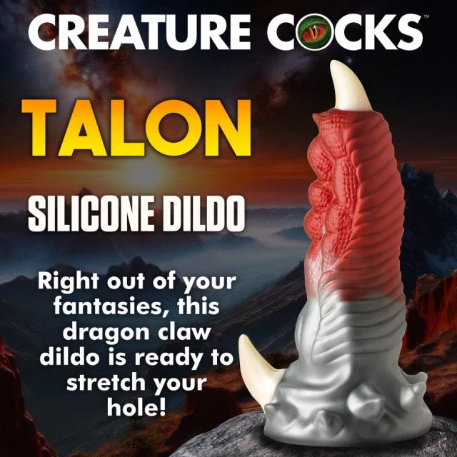 Silicone dildo with dragon claw design against a mountainous landscape background, featuring 'Creature Cocks' branding.